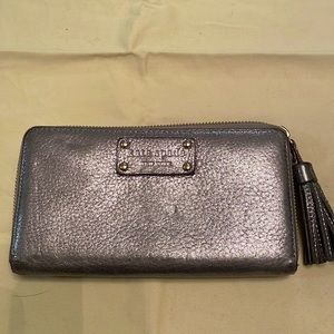 Kate Spade metallic wallet with tassel